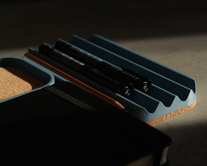 Wavy pen tray