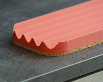 Wavy pen tray