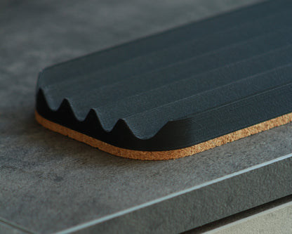 Wavy pen tray
