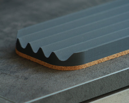 Wavy pen tray