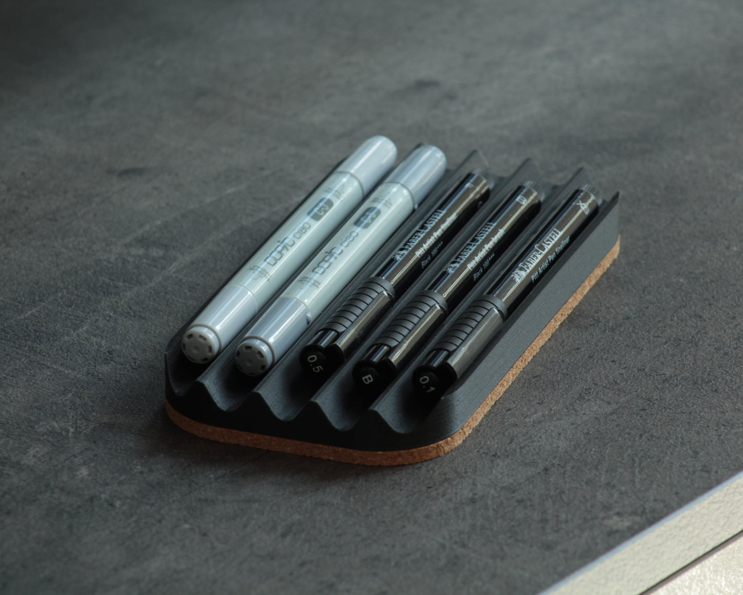 Wavy pen tray