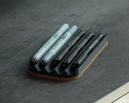 Wavy pen tray